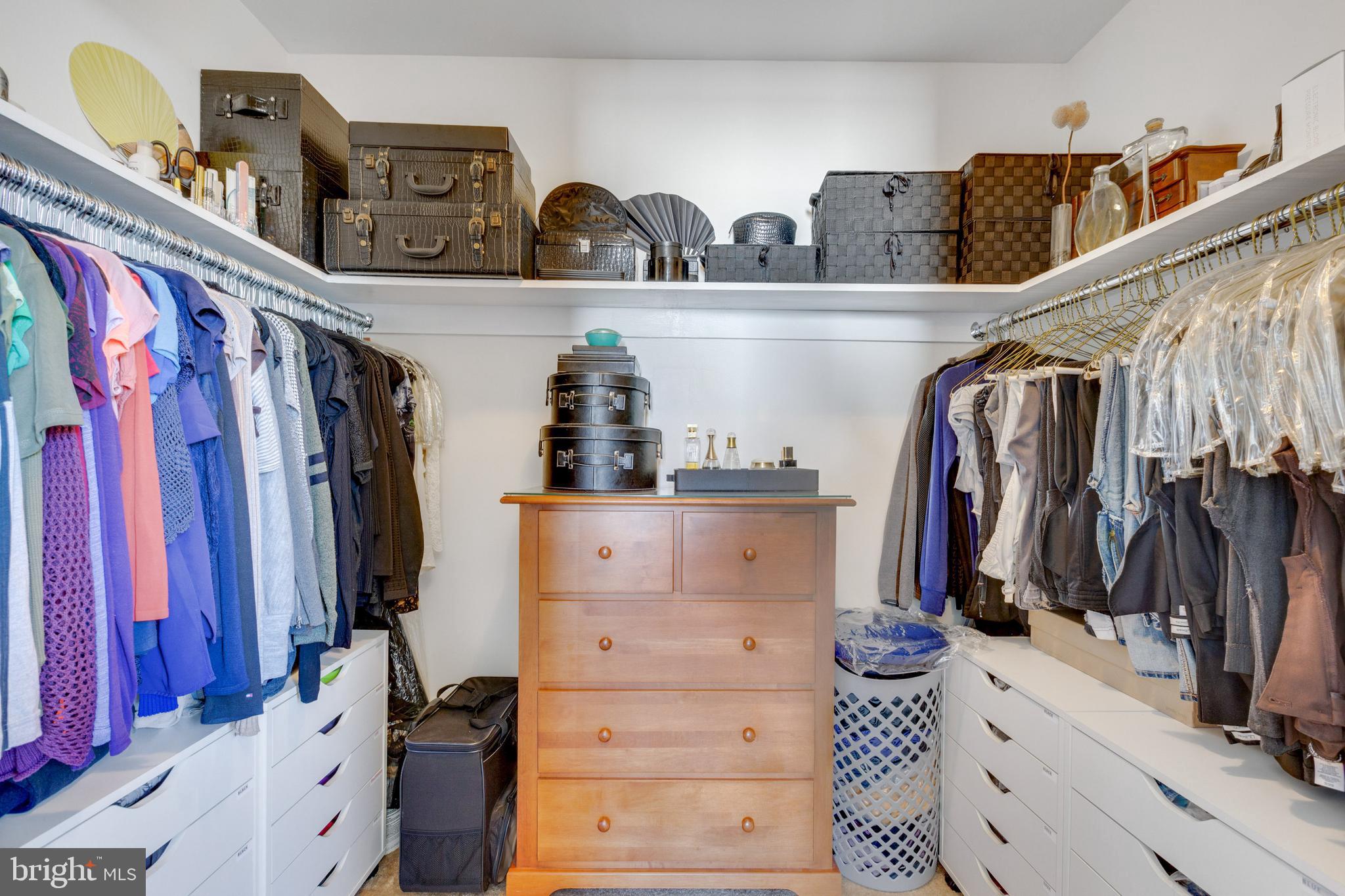 3903 Gannon Road Silver Spring, MD 20902 - Photo 18 of 51 a view of walk in closet with clothes and shoes