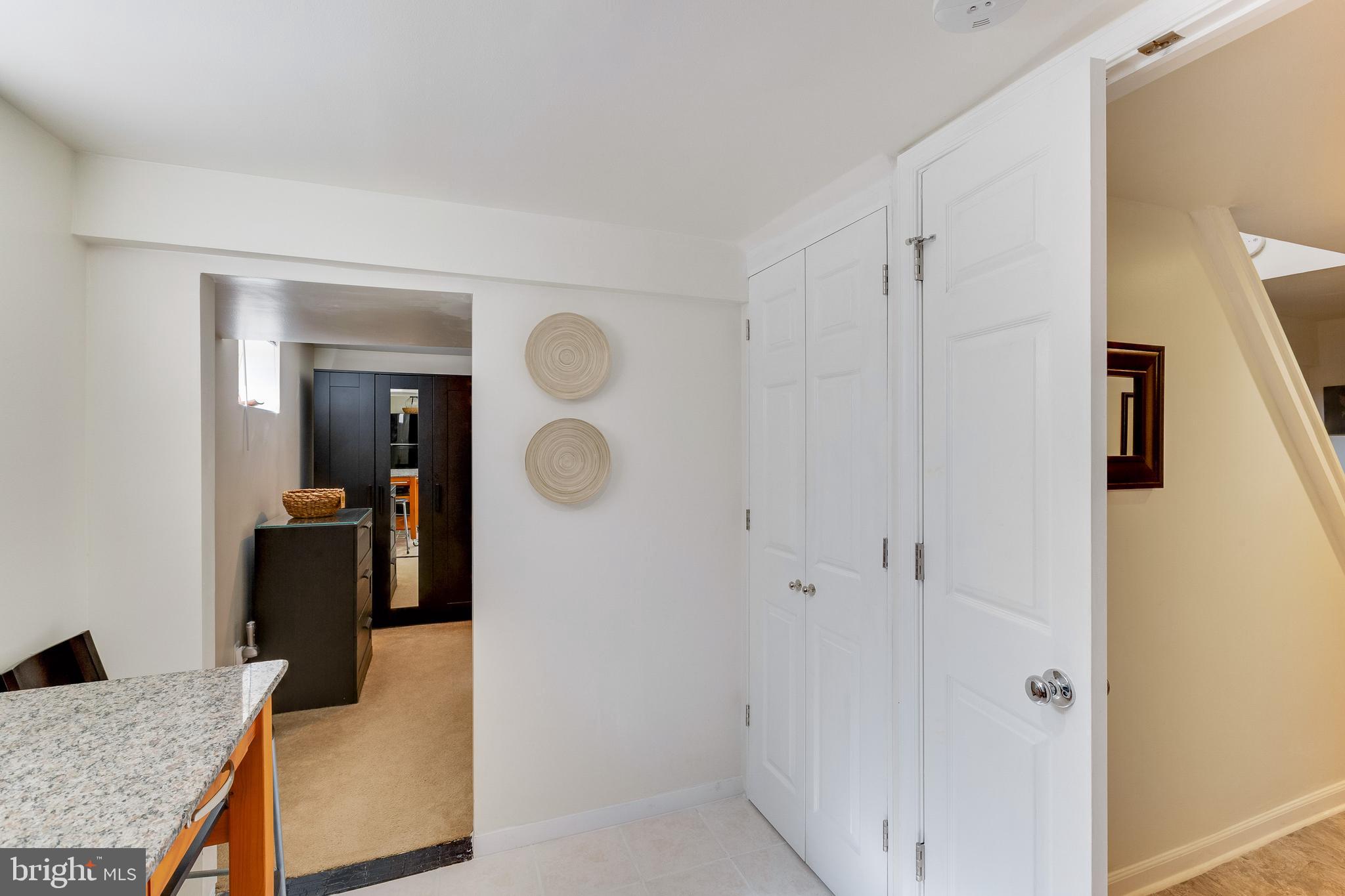 3903 Gannon Road Silver Spring, MD 20902 - Photo 40 of 51 a bedroom with a bed and furniture
