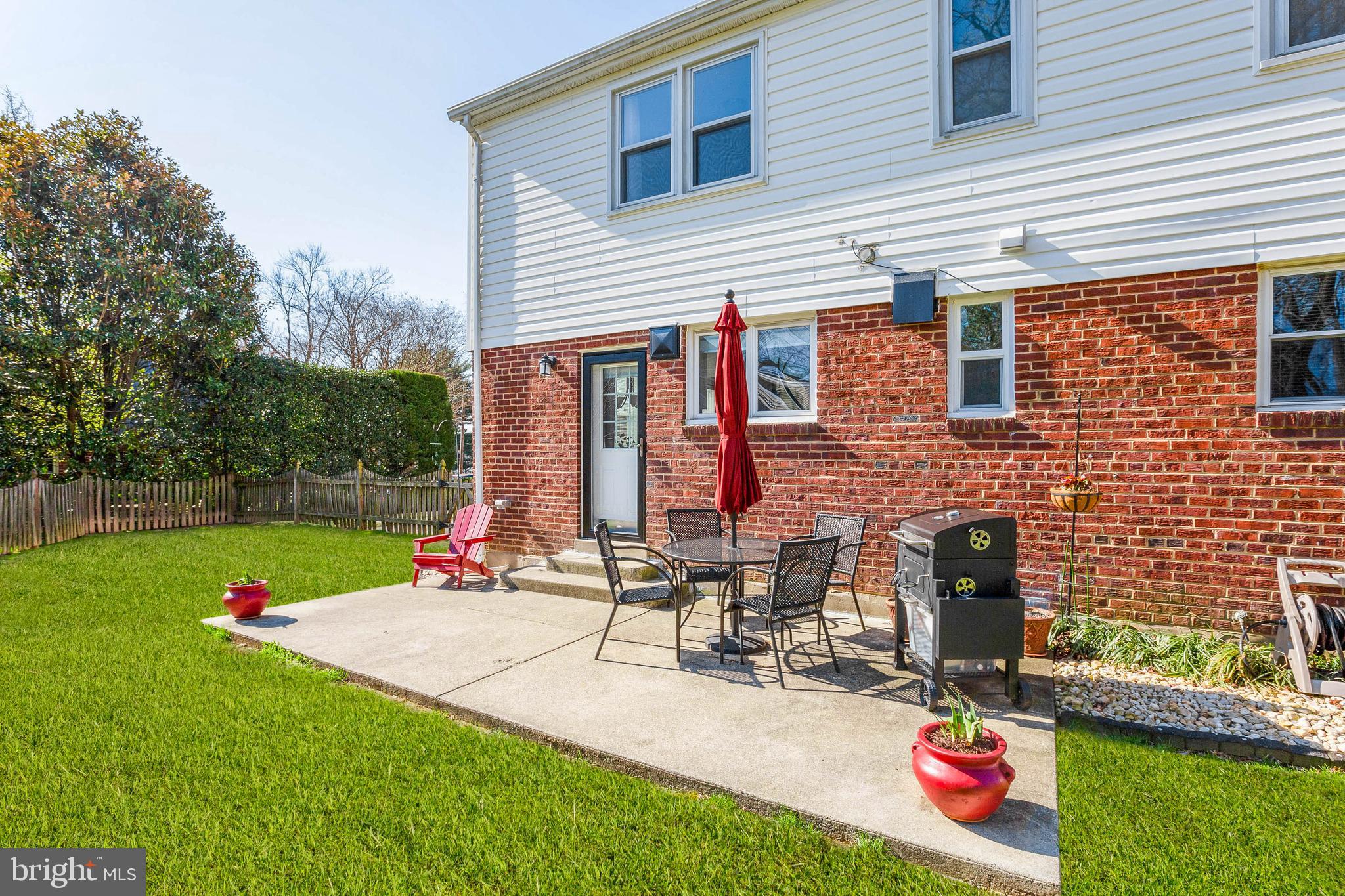 3903 Gannon Road Silver Spring, MD 20902 - Photo 49 of 51 a view of a backyard with a table and chairs