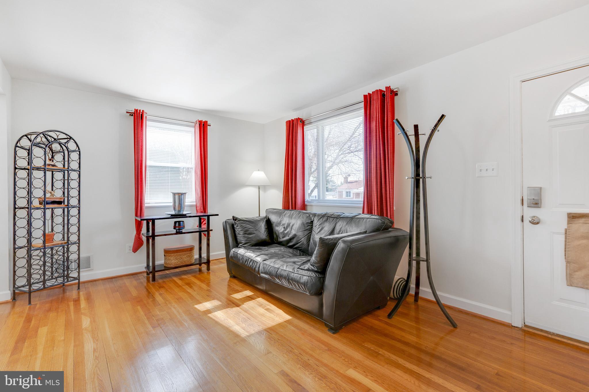3903 Gannon Road Silver Spring, MD 20902 - Photo 5 of 51 a living room with furniture and a wooden floor