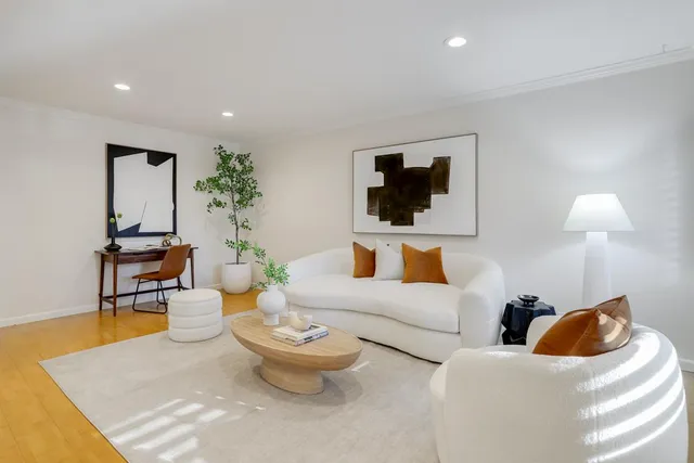 a kitchen with granite countertop sink table and chairs