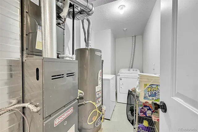 a bathroom with a mirror a sink and a shower