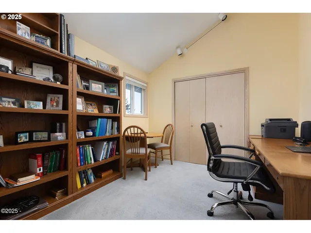 a view of a workspace with furniture