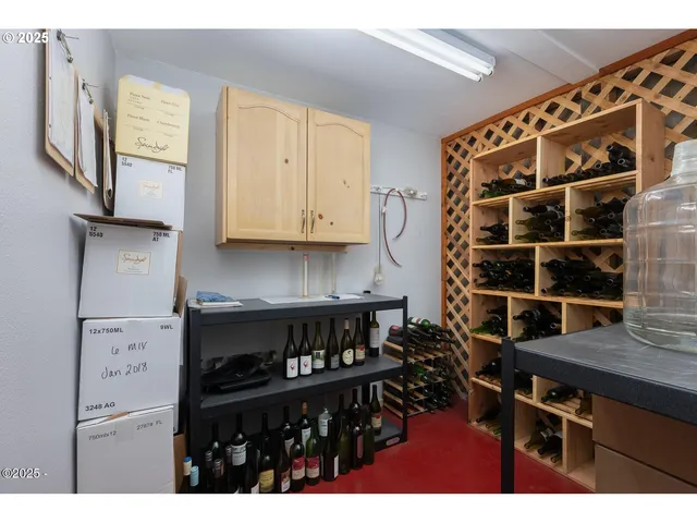 a kitchen with stainless steel appliances a stove and a refrigerator