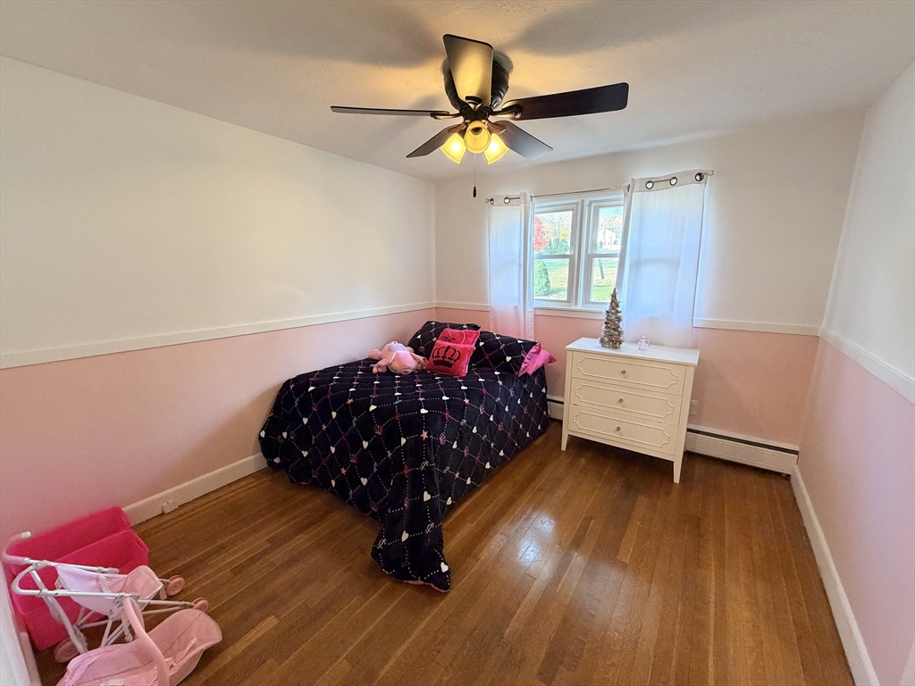 361 South Main Street Bellingham, MA 02019 - Photo 17 of 28 a bedroom with a bed and a window