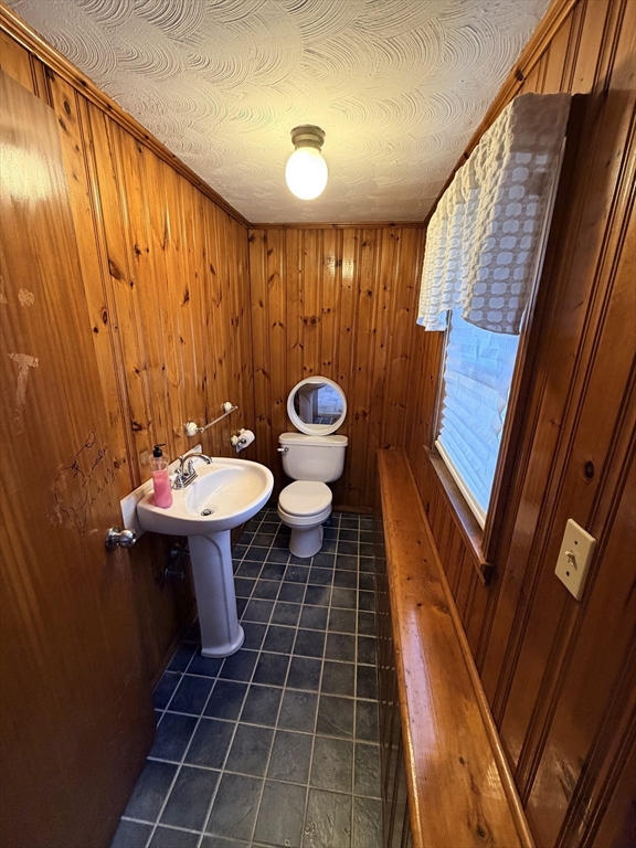 361 South Main Street Bellingham, MA 02019 - Photo 21 of 28 a bathroom with a sink and mirror