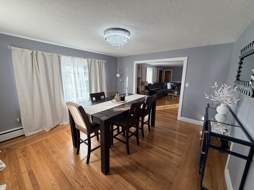 361 South Main Street Bellingham, MA 02019 - Photo 7 of 28 a view of a dining room with furniture and window