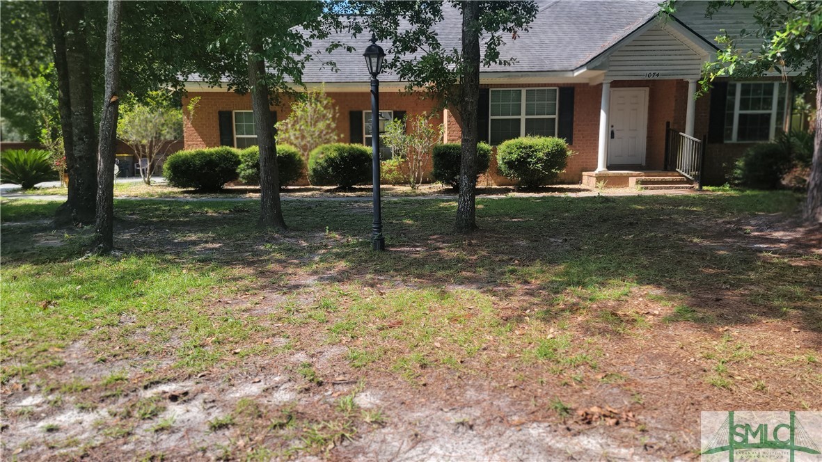 1074 Little McCall Road Guyton, GA 31312 - Photo 1 of 20 Front view of home.