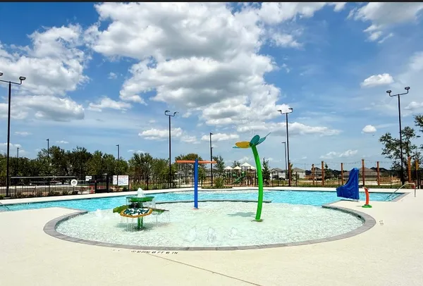 a view of a building with a street