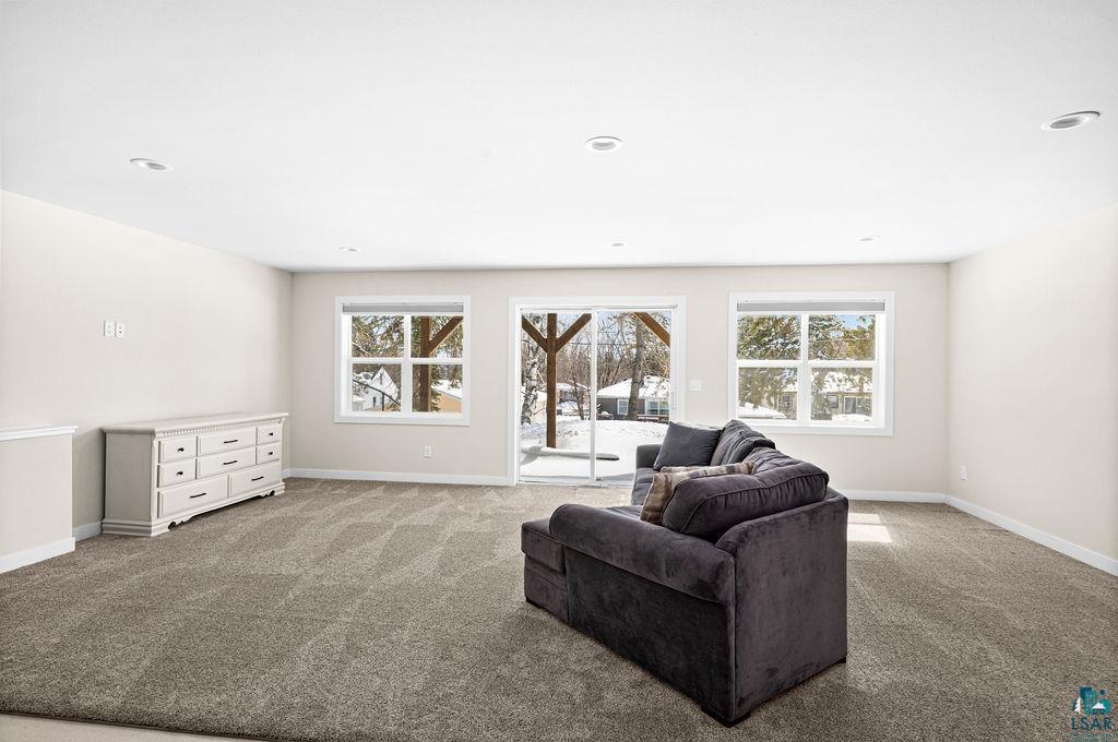 2236 Hoover Street Duluth, MN 55811 - Photo 26 of 52 Living area featuring plenty of natural light and carpet flooring