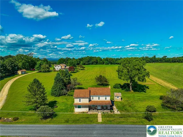 a view of a lake with a big yard