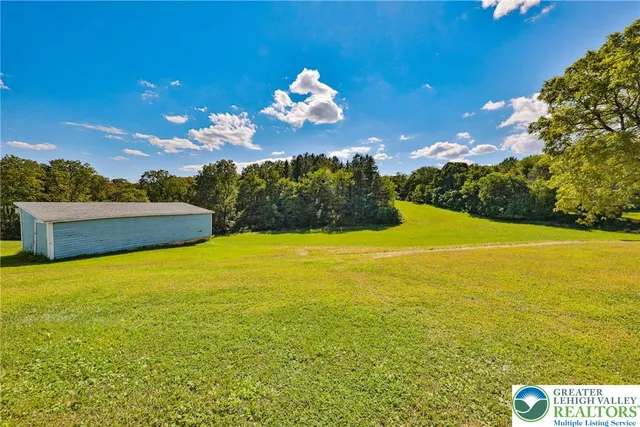 a view of an ocean and a mountain
