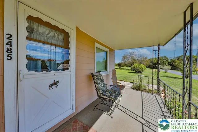 a view of balcony with furniture