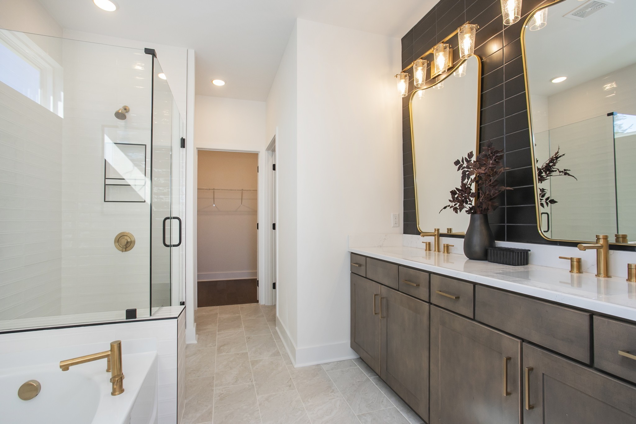 545 Scarlet Oak Road Lebanon, TN 37090 - Photo 27 of 36 a bathroom with a double vanity sink mirror and shower