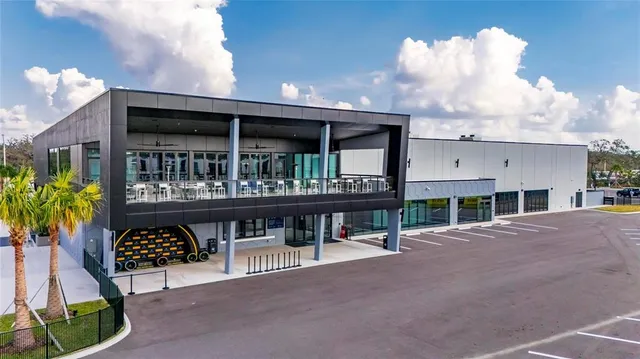 an aerial view of a chairs and table on the terrace