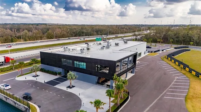 a view of a street with sitting area