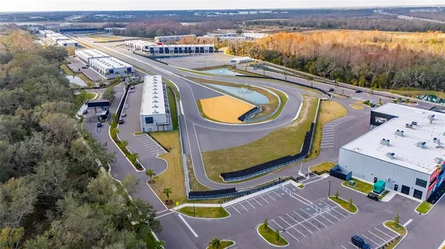a view of a swimming pool with seating area