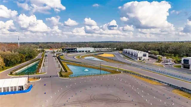 a view of a swimming pool and an outdoor space