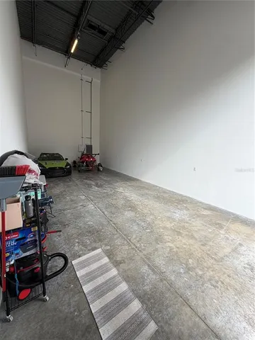 a view of room with gym equipment