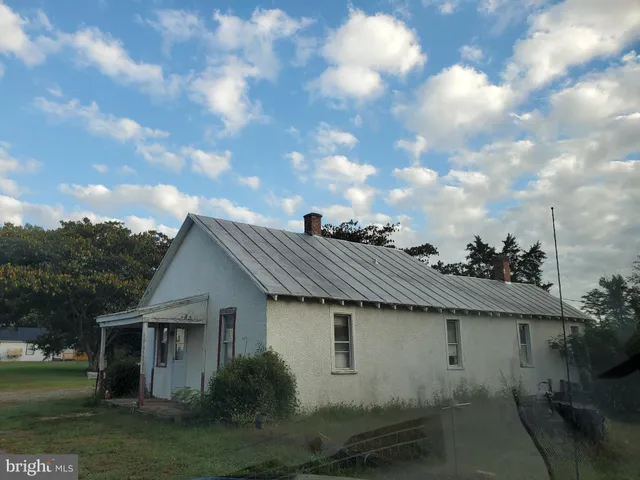 a view of house with outdoor space
