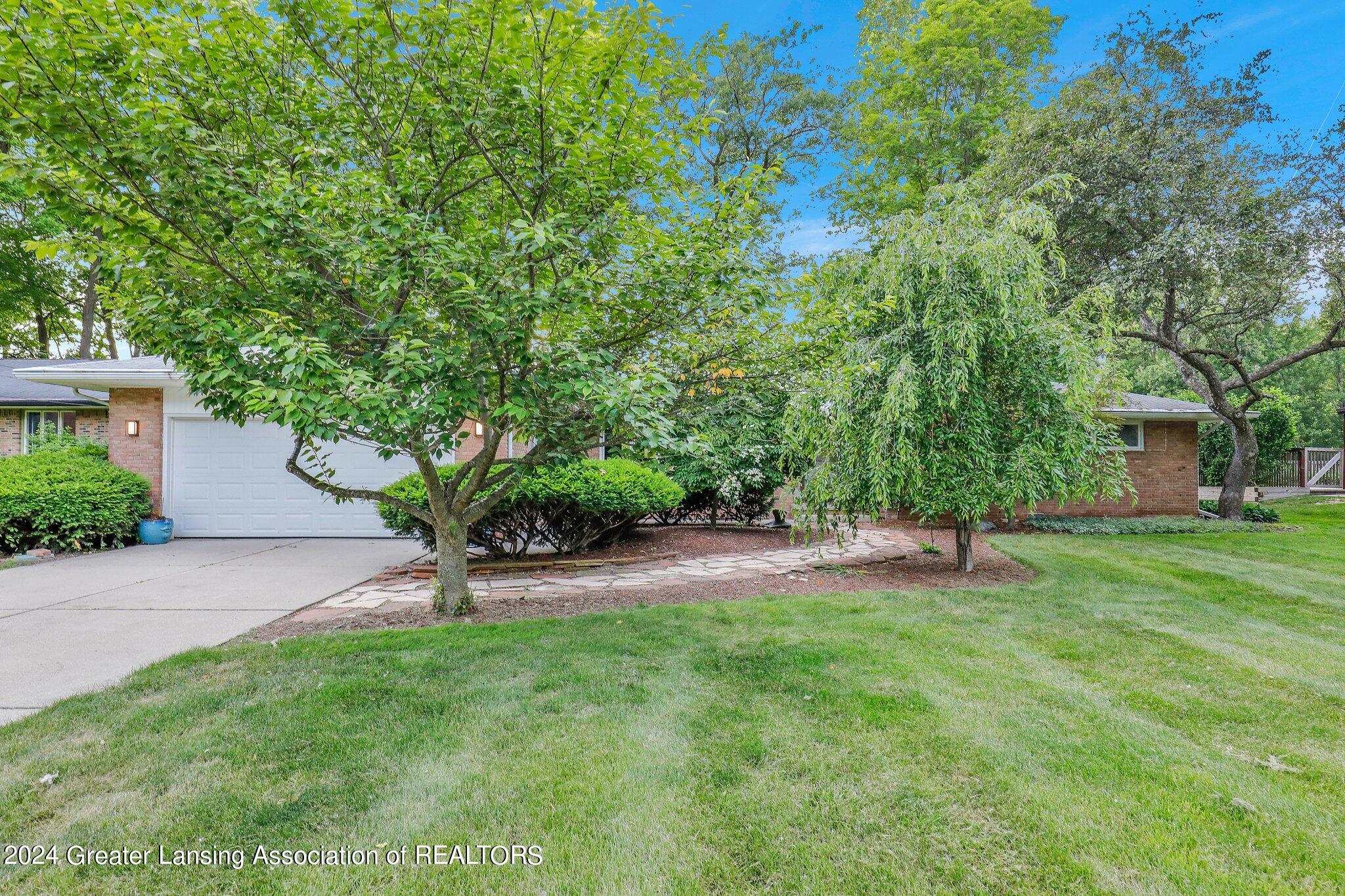 4751 Woodcraft Road Okemos, MI 48864 - Photo 2 of 34 3-web-or-mls-Open Ended Media-2
