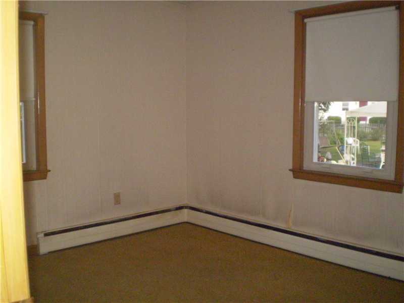 44 Togansett Road Providence, RI 02910 - Photo 8 of 16 Bedroom. HARDWOODS UNDER THE CARPETS