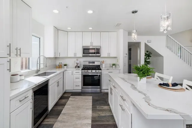 a view of living room with furniture and window