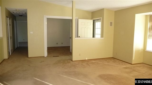 3455 Canvasback Lane Reno, NV 89508 - Photo 3 of 9 an empty room with windows and closet
