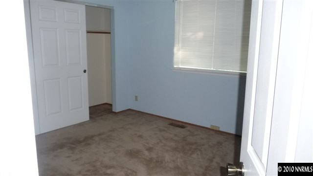 3455 Canvasback Lane Reno, NV 89508 - Photo 7 of 9 a view of an empty room with a window