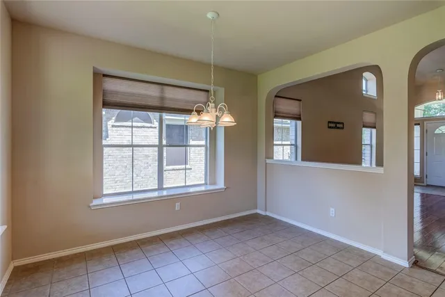 a view of an empty room with window