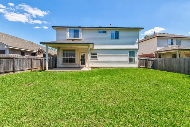 a house view with a sitting space and garden view