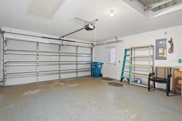a view of a livingroom with furniture and a ceiling fan