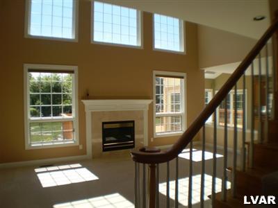 860 Benner Road Allentown, PA 18104 - Photo 8 of 29 family room with stairs to second floor