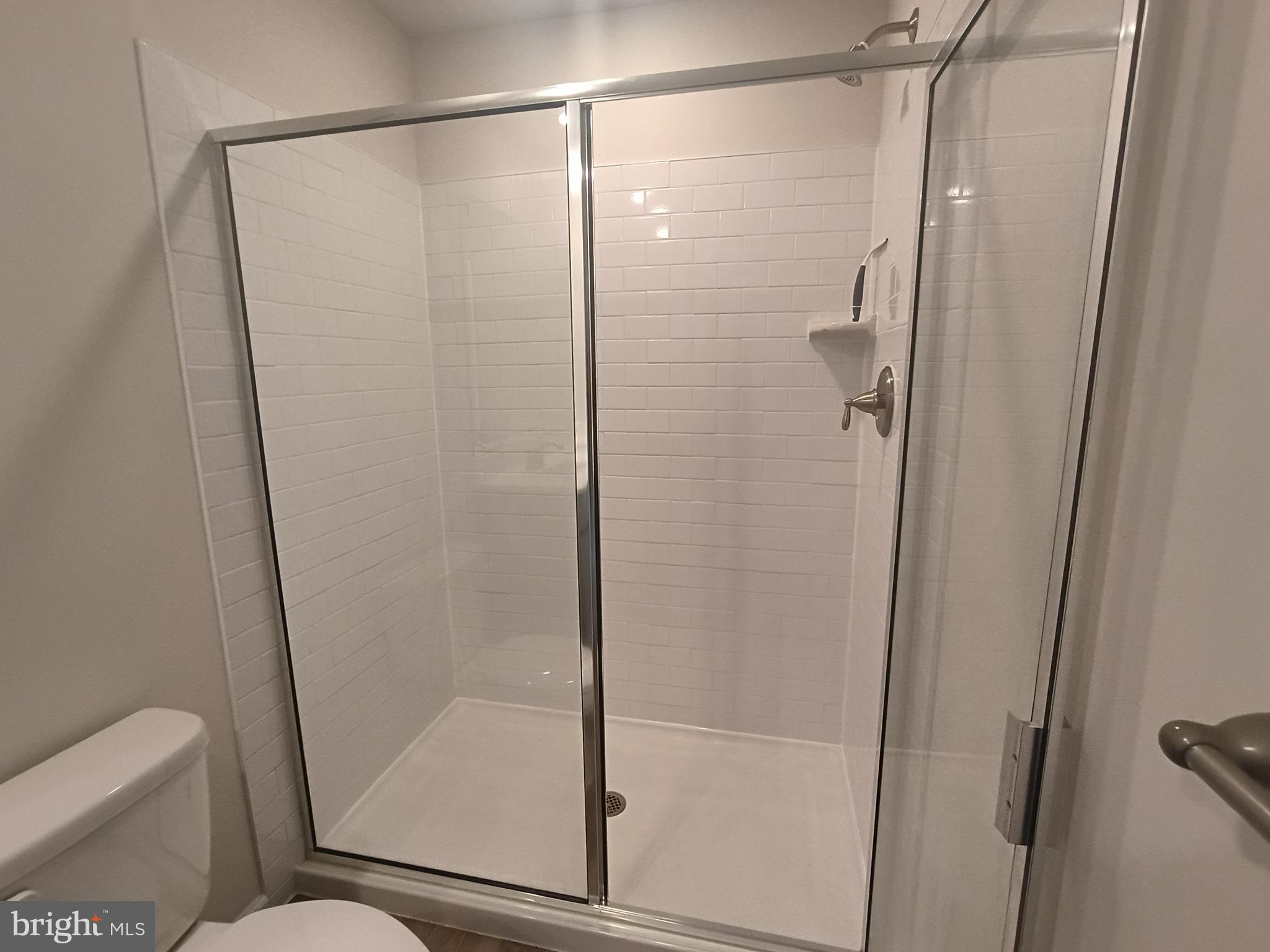 25 Elliot Lane Westampton, NJ 08060 - Photo 11 of 14 a bathroom with a shower and toilet