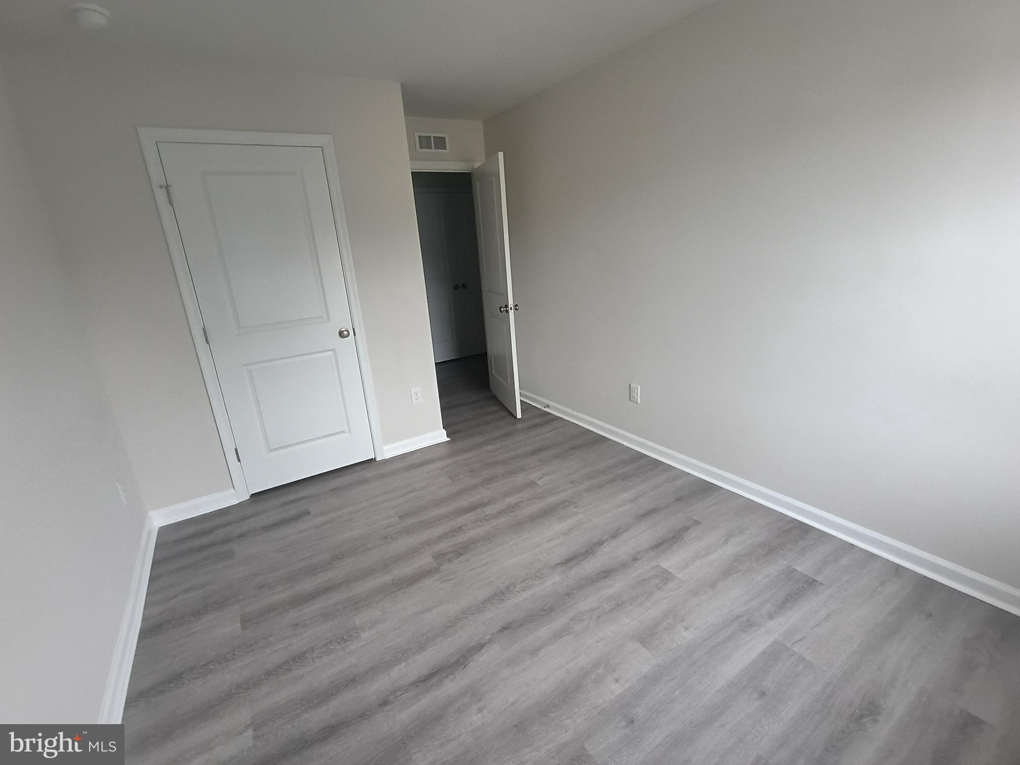 25 Elliot Lane Westampton, NJ 08060 - Photo 9 of 14 a view of an empty room with wooden floor