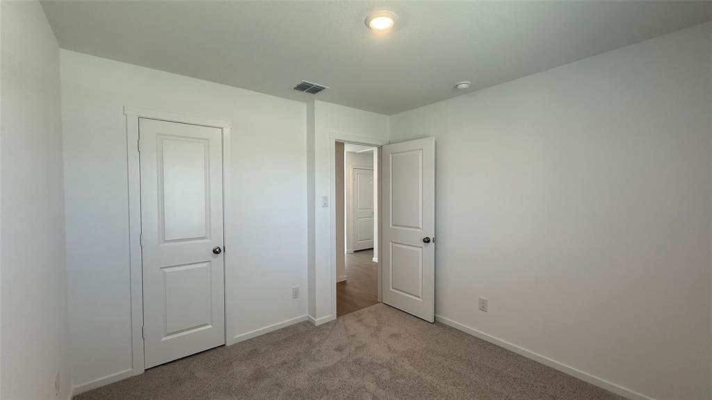 7701 Rutherford Lane McKinney, TX 75069 - Photo 15 of 20 a view of an empty room