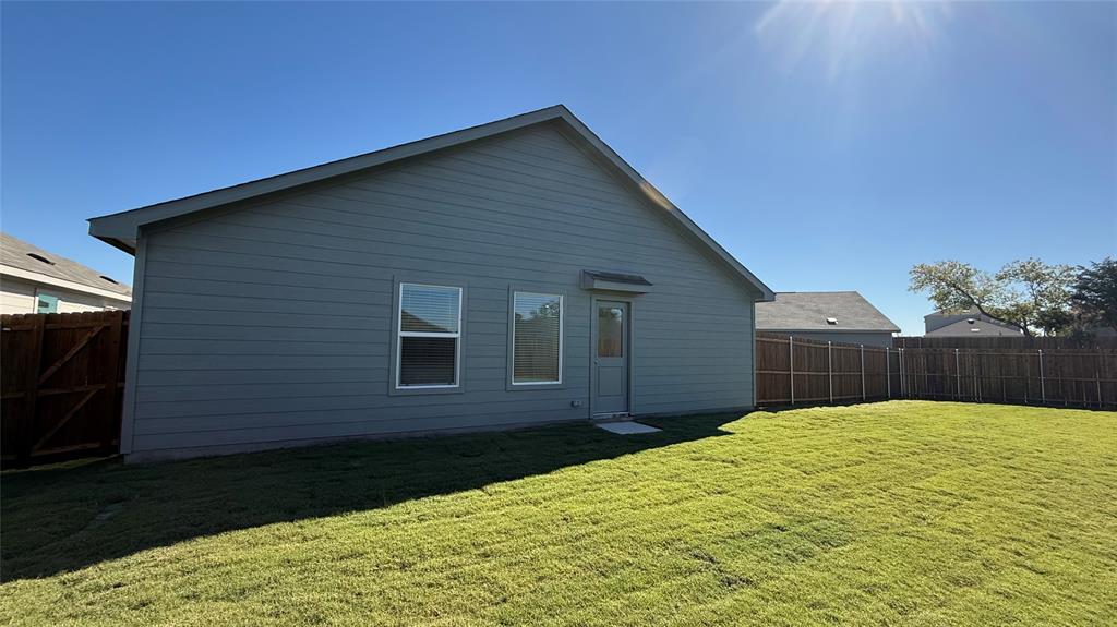 7701 Rutherford Lane McKinney, TX 75069 - Photo 20 of 20 a house view with a backyard space