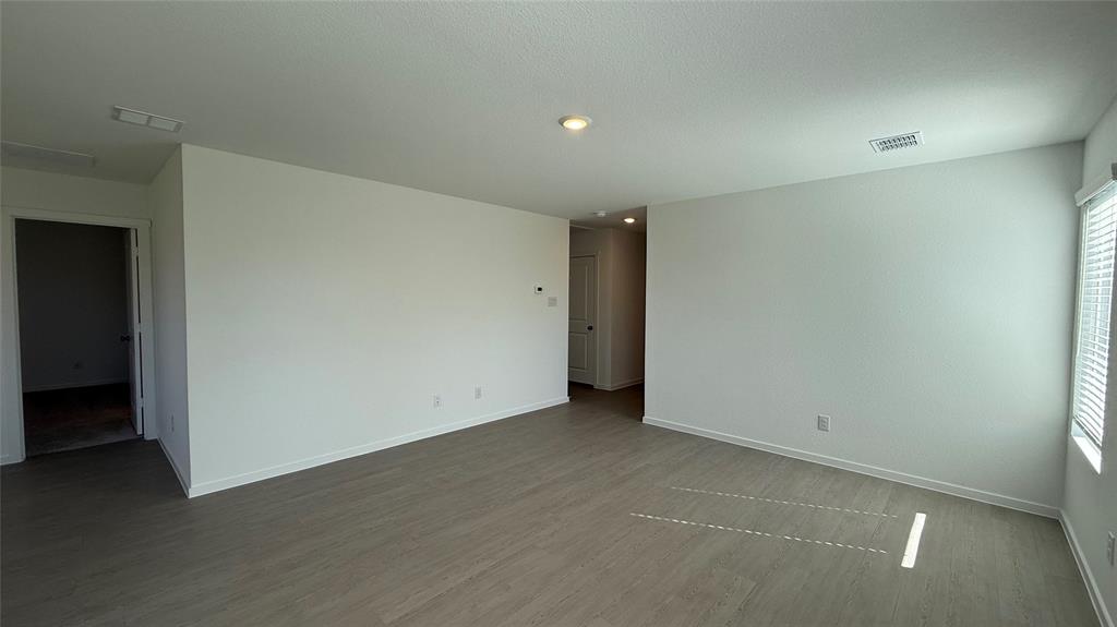 7701 Rutherford Lane McKinney, TX 75069 - Photo 9 of 20 an empty room with a empty space