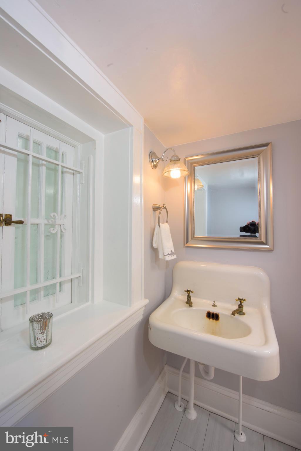402 Marlow Road Baltimore, MD 21218 - Photo 9 of 27 Main Level Powder Room