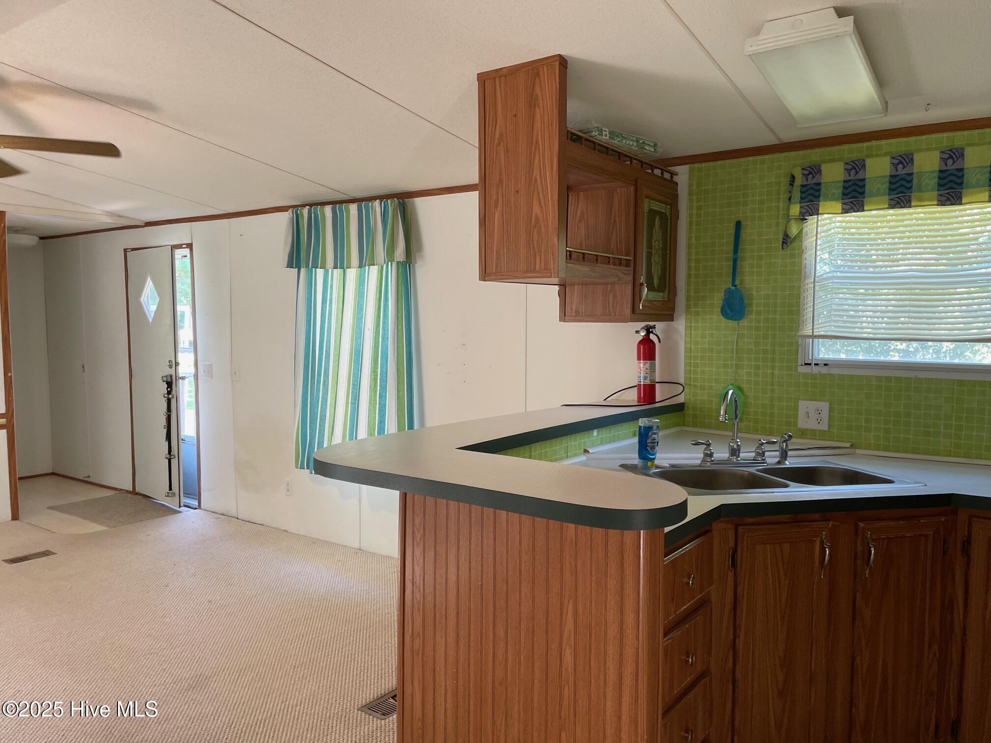 108 Conch Court Gloucester, NC 28528 - Photo 14 of 20 Kitchen (joins Living Rm)