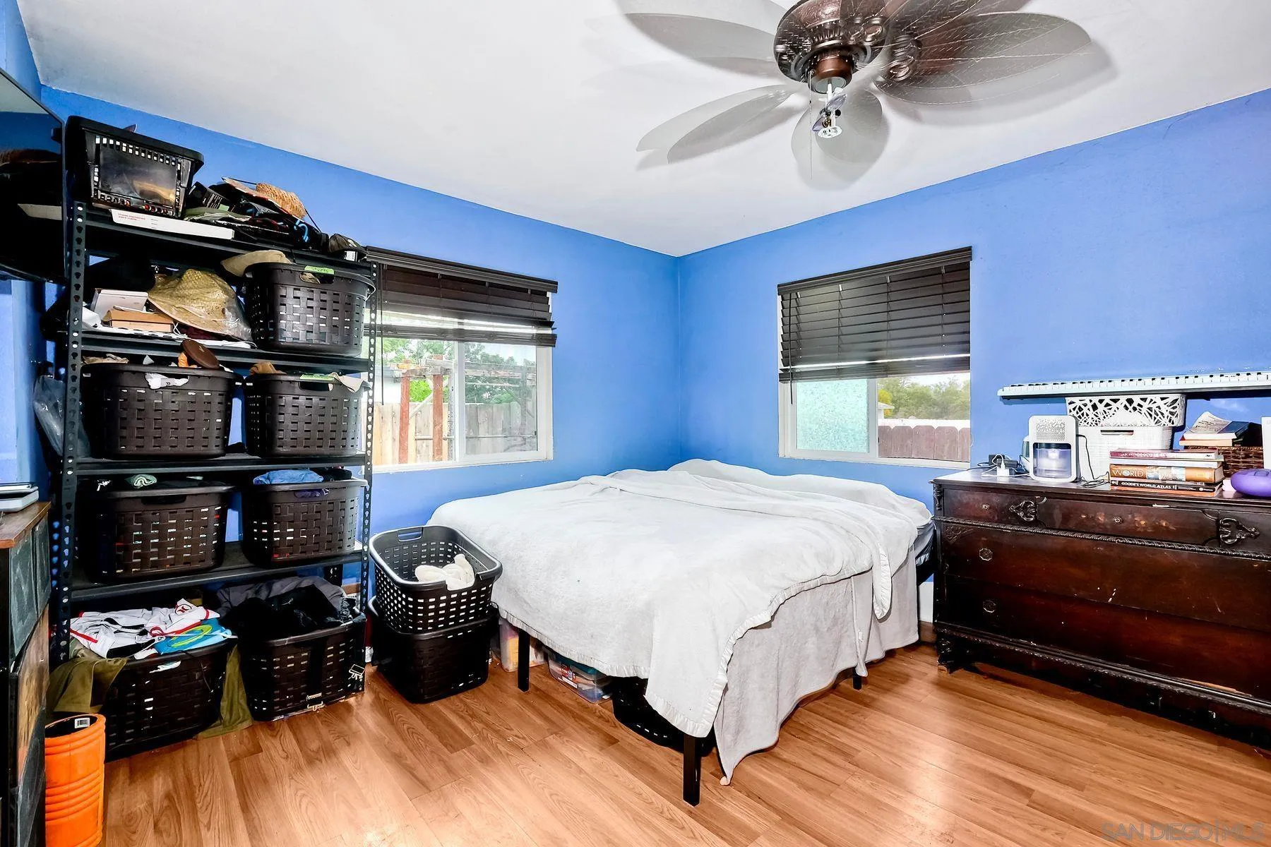 9428 Prospect Avenue Santee, CA 92071 - Photo 11 of 23 a bedroom with a bed dresser and a window