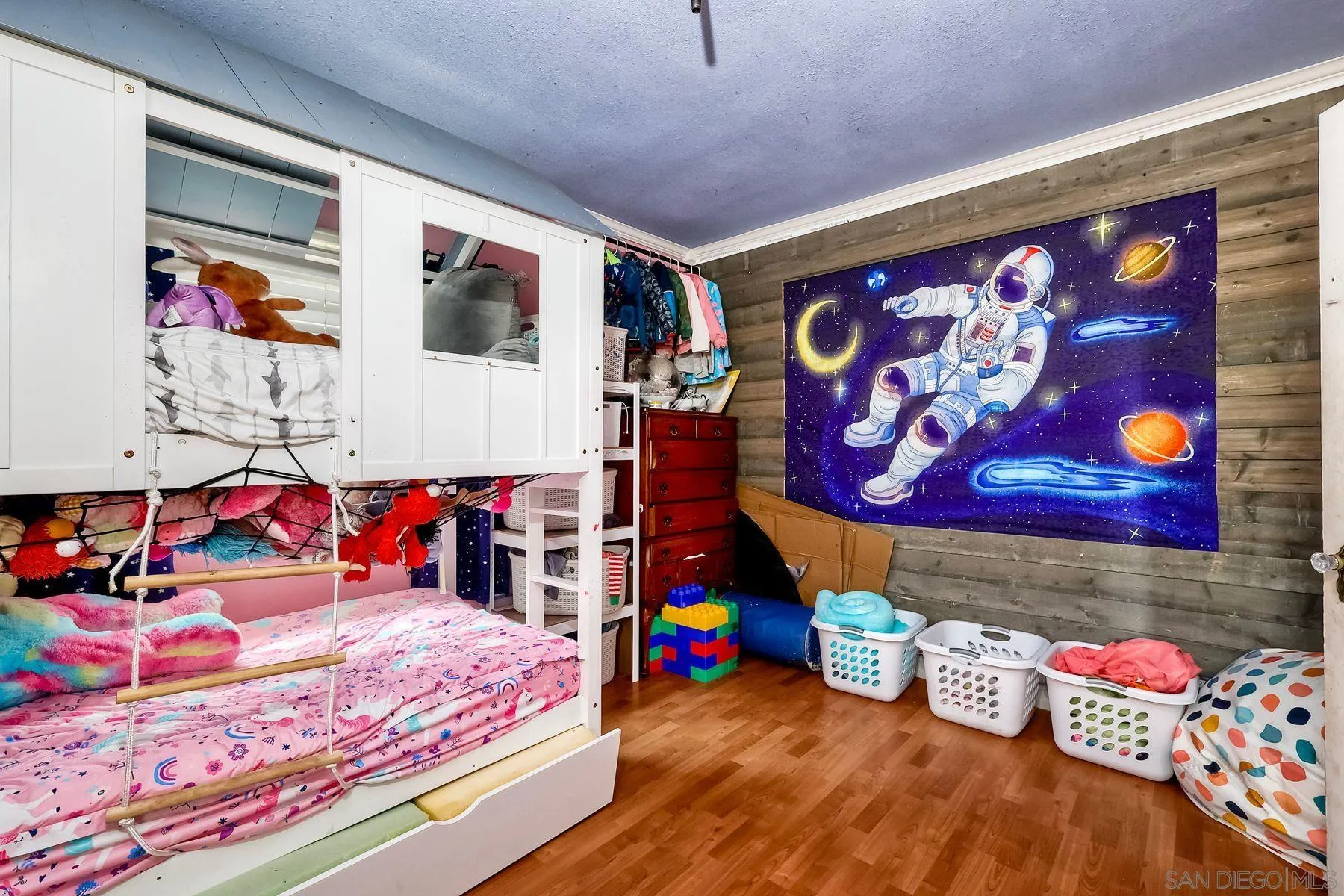 9428 Prospect Avenue Santee, CA 92071 - Photo 16 of 23 a bed room with a bed and a couch