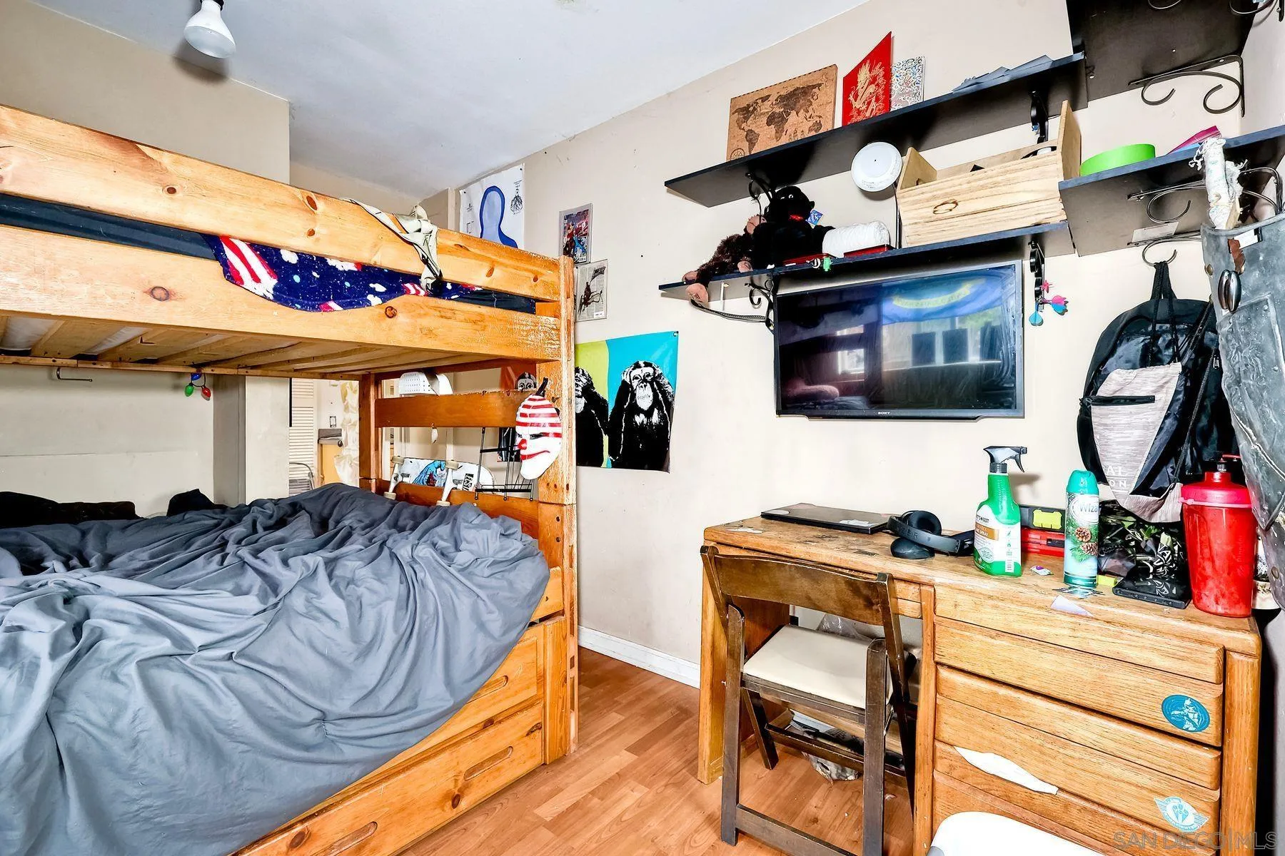 9428 Prospect Avenue Santee, CA 92071 - Photo 18 of 23 a bedroom with bed and cabinets