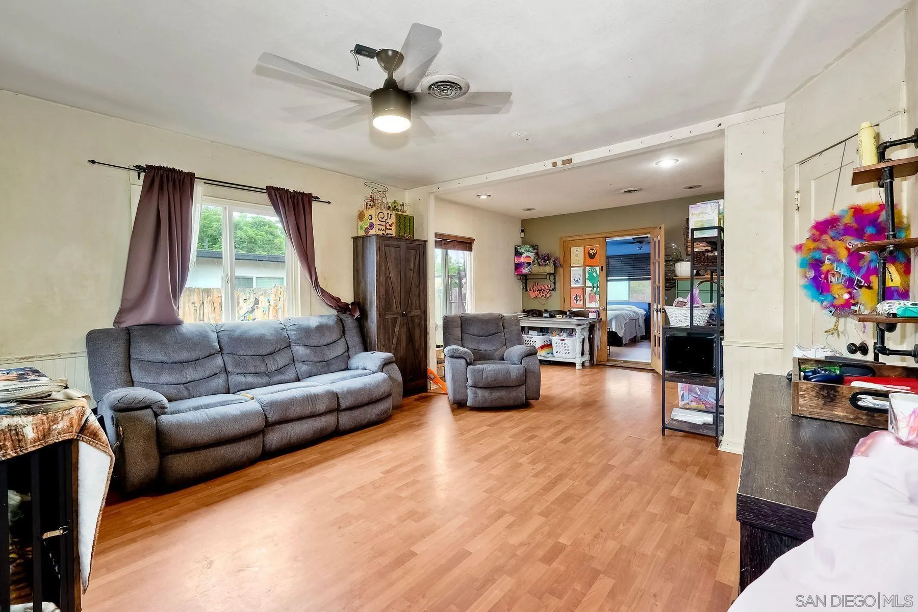 9428 Prospect Avenue Santee, CA 92071 - Photo 3 of 23 a living room with furniture and a large window
