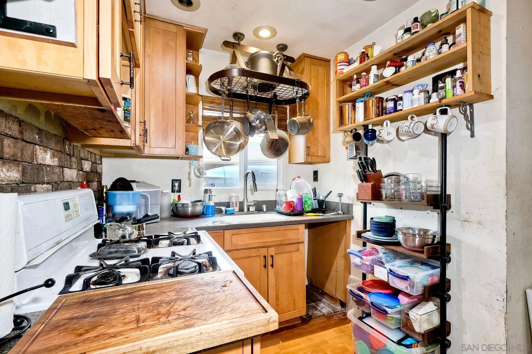 9428 Prospect Avenue Santee, CA 92071 - Photo 10 of 23 a room with lots of white furniture and wooden floor