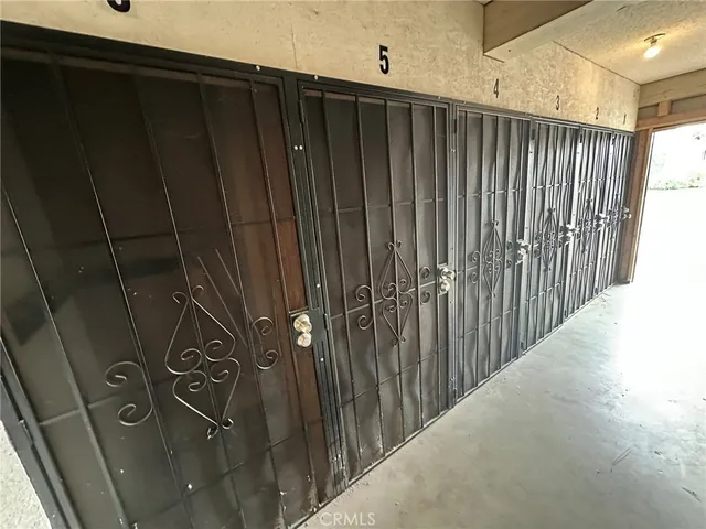 a view of a balcony with wooden fence