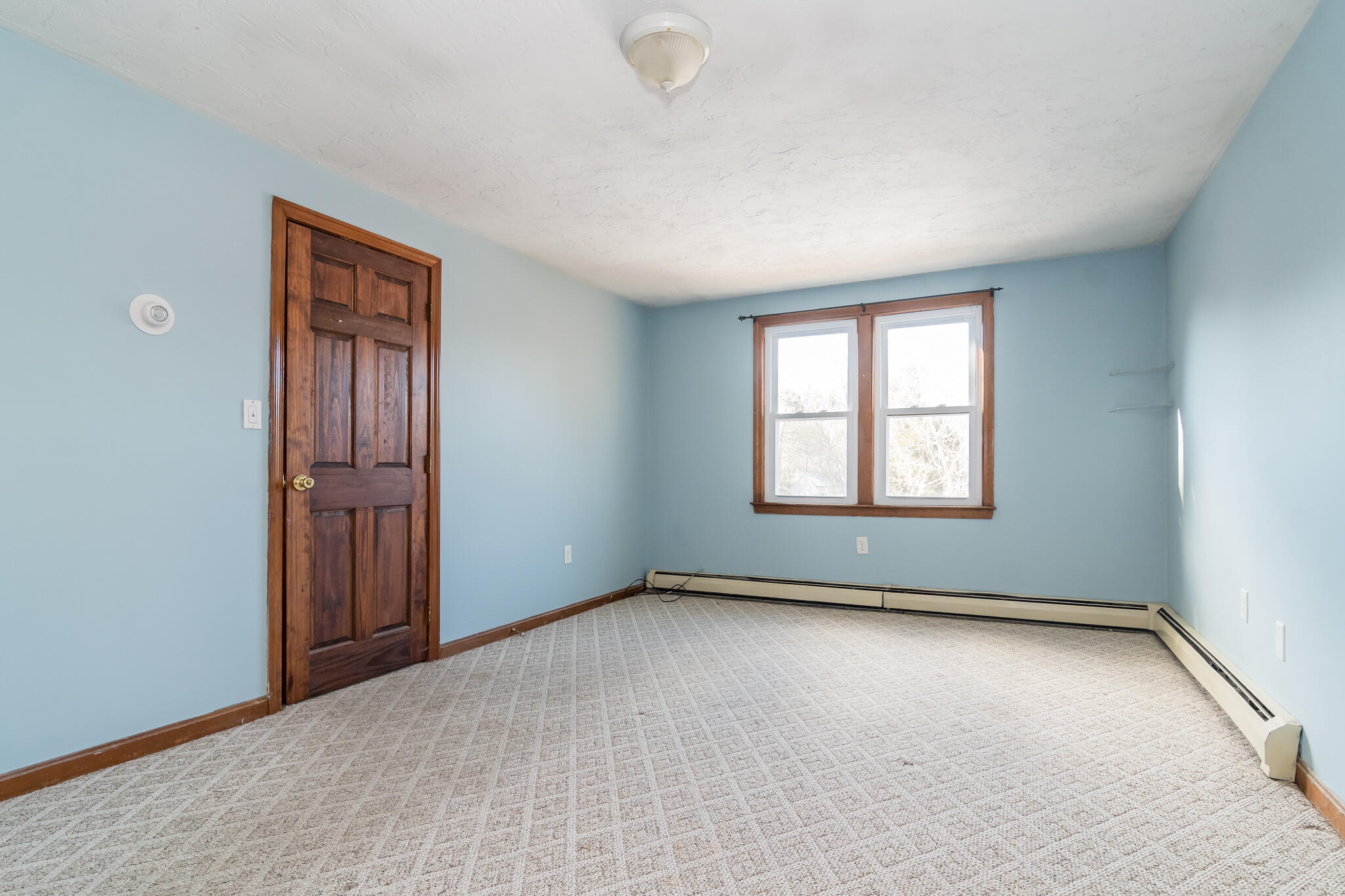 62 Windsor Road Sandwich, MA 02563 - Photo 15 of 24 an empty room with windows
