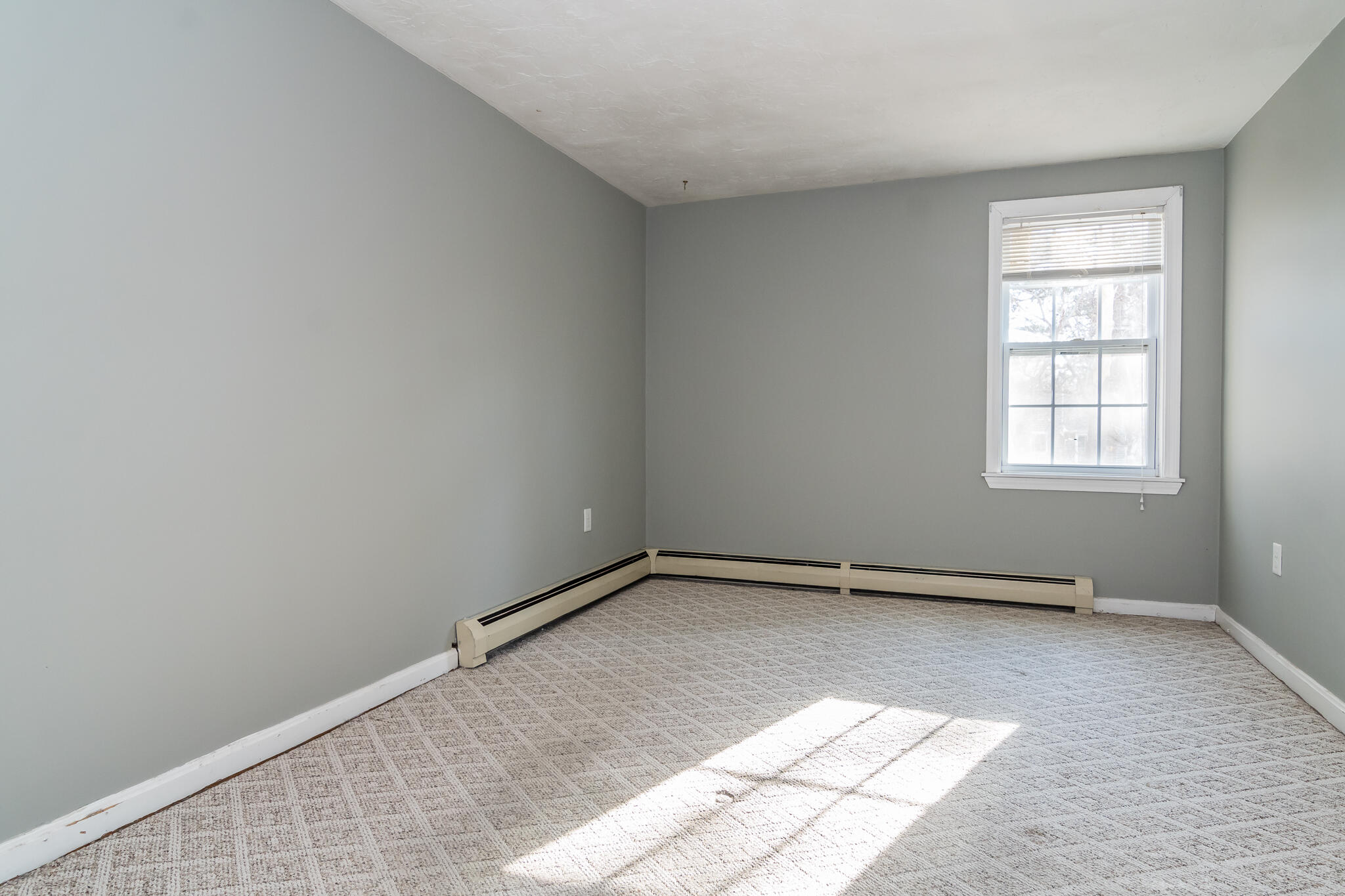 62 Windsor Road Sandwich, MA 02563 - Photo 18 of 24 an empty room with windows
