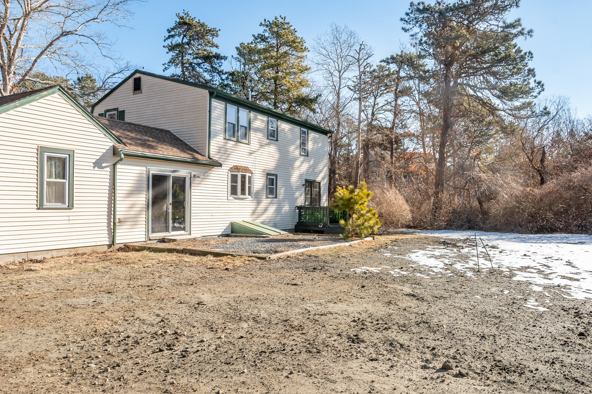 62 Windsor Road Sandwich, MA 02563 - Photo 21 of 24 a house with a tree in front of it