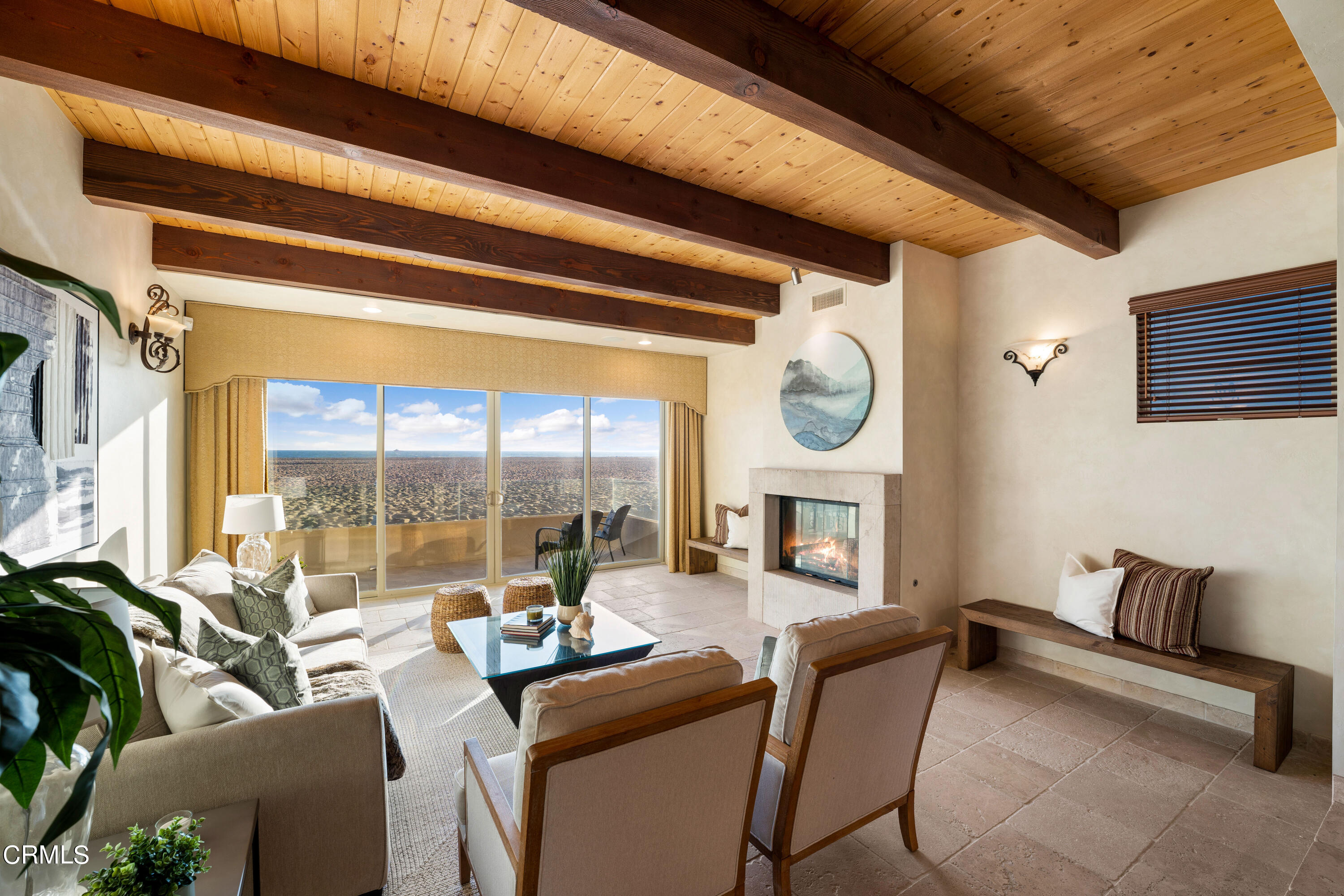 209 Ocean Drive Oxnard, CA 93035 - Photo 6 of 49 a living room with furniture a fireplace and a large window
